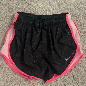 pink and black nike dry-fit shorts